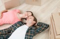 Young couple lying on the floor Royalty Free Stock Photo