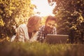 Young couple lying on the grass. Royalty Free Stock Photo