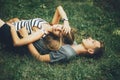 Young couple lying on the grass