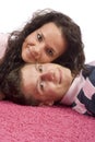 Young couple lying on the pink carpet