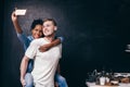 Young couple make selfie on kitchen, live together