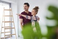 Young couple making plans for home improvement Royalty Free Stock Photo