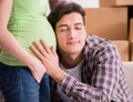 Young couple of man and pregnant wife expecting baby Royalty Free Stock Photo