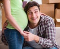 Young couple of man and pregnant wife expecting baby Royalty Free Stock Photo