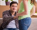 Young couple of man and pregnant wife expecting baby Royalty Free Stock Photo