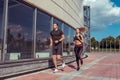 Young couple man and woman run jogging in morning, active lifestyle, sportswear, summer in the city, fitness in nature