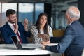 Young couple meeting financial advisor for home investment Royalty Free Stock Photo