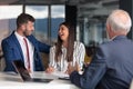 Young couple meeting financial advisor for home investment Royalty Free Stock Photo