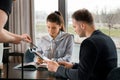 Young couple with menu in a restaurant making order Royalty Free Stock Photo