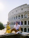 young couple mid age on a city trip in Rome Italy Europe, Colosseum Coliseum building in Rome, Italy Royalty Free Stock Photo