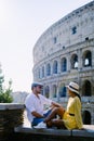 young couple mid age on a city trip in Rome Italy Europe, Colosseum Coliseum building in Rome, Italy Royalty Free Stock Photo