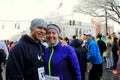 Young couple in middle of throng,getting ready to run the Annual Christopher Dailey Turkey Trot,Saratoga Springs,New York,2014