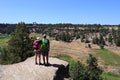 Young couple on Misery Ridge Trail in Smith Rock State Park, Oregon. Royalty Free Stock Photo