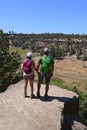 Young couple on Misery Ridge Trail in Smith Rock State Park, Oregon. Royalty Free Stock Photo