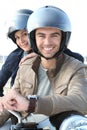 Young couple on motorbike Royalty Free Stock Photo