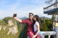 Young Couple Mountain View Point Happy Smiling Man And Woman Taking Selfie Photo On Cell Smart Phone Asian Holiday Royalty Free Stock Photo