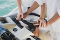 Young couple navigating on a yacht in Indian ocean. Royalty Free Stock Photo