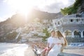 Young couple near beach in sunny day, Positano, Amalfi coast, Italy Royalty Free Stock Photo