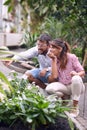 Young couple observing beautiful plants