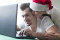 Young couple online shopping on laptop woman hug man Royalty Free Stock Photo