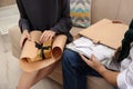 Young couple opening parcels in living room Royalty Free Stock Photo