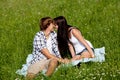 Young couple outdoor in summer on blanket Royalty Free Stock Photo