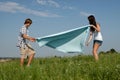 Young couple outdoor in summer on blanket Royalty Free Stock Photo