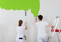 Young couple painting wall Royalty Free Stock Photo