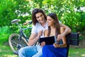 Young couple on the park bench Royalty Free Stock Photo