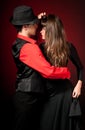 Young couple passion dancing on red light back Royalty Free Stock Photo