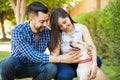 Young couple petting their dog Royalty Free Stock Photo