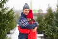 Couple buying Christmas tree Royalty Free Stock Photo