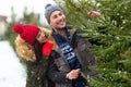 Couple buying Christmas tree Royalty Free Stock Photo