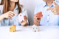 Young couple looking for comparison information on their decision to buy a new home Royalty Free Stock Photo