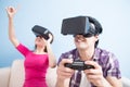 Young couple play vr game