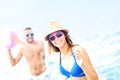 Young couple playing with a ball at the beach Royalty Free Stock Photo