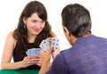 Young couple playing cards cuarenta