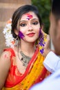 Young couple playing with colors on the festival of colours called Holi, popular hindu festival celebrated across India. Royalty Free Stock Photo