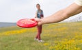 Young couple playing frisbee Royalty Free Stock Photo