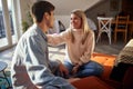 A young couple playing while having a breakfast at home. Love, together, breakfast, home Royalty Free Stock Photo