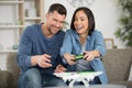 young couple playing video game together at home Royalty Free Stock Photo