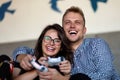 Young couple playing video games at home Royalty Free Stock Photo