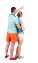 Young couple pointing. Royalty Free Stock Photo