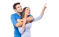 Young couple pointing up Royalty Free Stock Photo