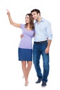 Young couple pointing up Royalty Free Stock Photo
