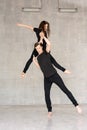 Young couple practices acrobatic balance. Royalty Free Stock Photo