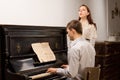 Young couple practicing a musical duet Royalty Free Stock Photo