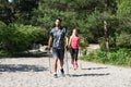 Young couple practicing nordic`s walk