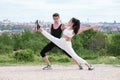 Young couple practicing street dance, ballet, dancing steps, movements. Royalty Free Stock Photo