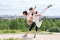 Young couple practicing street dance, ballet, dancing steps, movements. Royalty Free Stock Photo